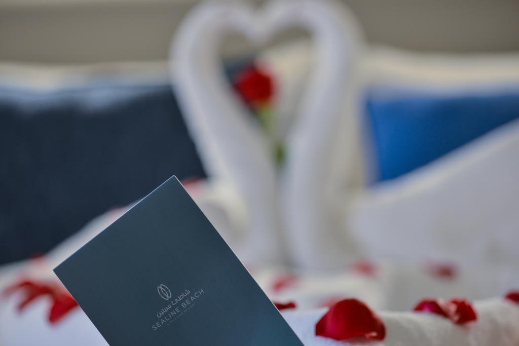 Sealine Beach, A Murwab Resort Mesaieed Luaran gambar A menu at the Waldorf Astoria Ras Al Khaimah